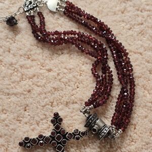 Elegant Multi-Strand Garnet Crucifix with Silver Accents